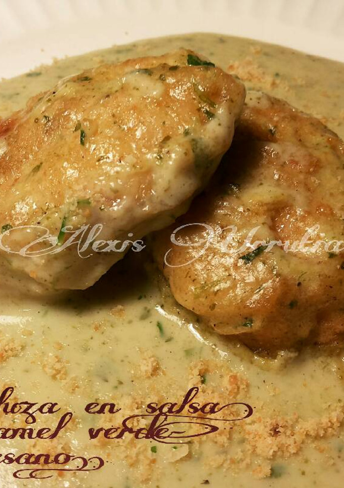 Una foto de Merluza en salsa bechamel verde, y parmesano