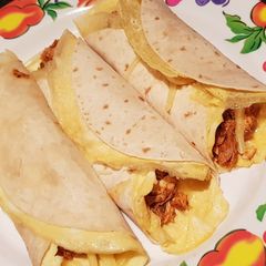Curry Chicken Egg Cheese Tortilla Wrap A picture of Curry Chicken Egg Cheese Tortilla Wrap.