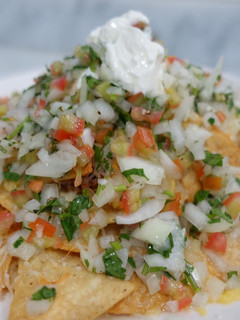 Una foto de Nachos de Carne Mechada