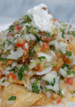 Una foto de Nachos de Carne Mechada