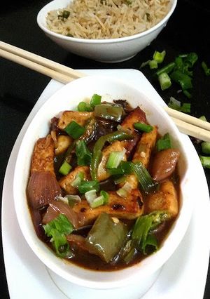 A picture of Chilli Paneer (Paneer or Cottage Cheese in a hot spicy Chinese gravy).