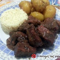 A picture of Pork tenderloin with prunes and Mavrodaphne wine.
