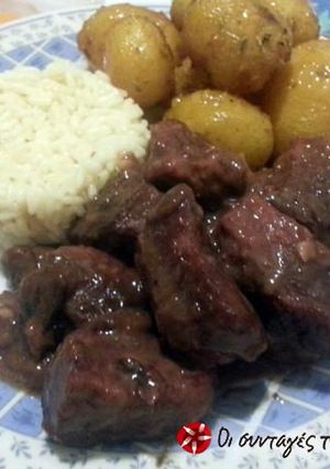 A picture of Pork tenderloin with prunes and Mavrodaphne wine.
