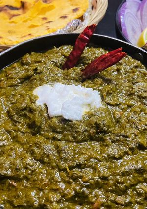 A picture of Sarson Ka Saag and Makki Ki Roti.