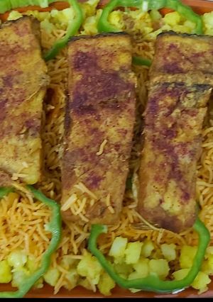 صورة لوصفة رز أحمر مع السمك المقلي من أطيب الاكلات 😋🤤