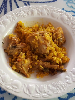 Una foto de 59. Conejo con arroz