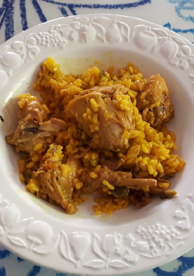 Una foto de 59. Conejo con arroz