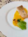 Trancio di salmone al lardo su crema di zucca