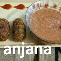 A picture of Instant raw mango chutney with leftover rice nuggets.