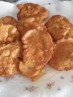 Una foto de Tortillitas de ajo y perejil