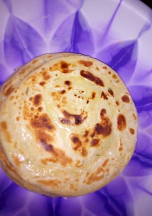 A picture of Layered chapati n pojo.