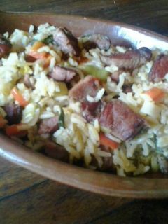 Una foto de Arroz con lapa ahumada