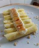 Canutillos de carpaccio de piña rellenos de crema pastelera y azúcar quemado
