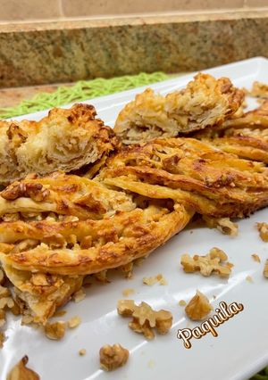 Una foto de Clásica trenza de hojaldre con crema de avellanas, nueces & almendra