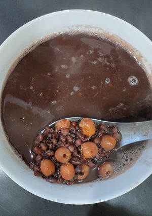 A picture of Red Bean, Black Glutinous Rice, and Lotus Seed Sweet Soup.