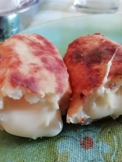 Una foto de Bombas de papa con queso