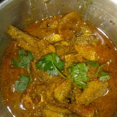 A picture of Small fish with garam masala curry.