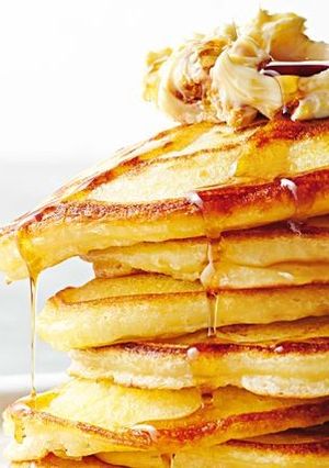 A picture of Butter milk pancakes with whipped honeycomb butter.
