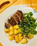 Pesto, Crusted Lamb Steak and Roast Potatoes with broccoli salad
