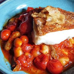 A picture of Ndjua Crusted Cod with bean stew.