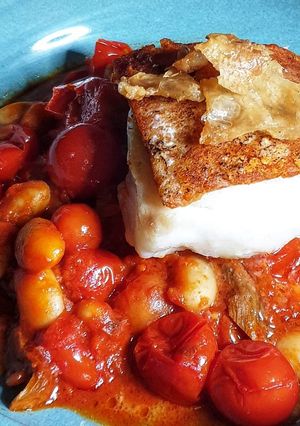A picture of Ndjua Crusted Cod with bean stew.