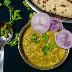 A picture of Green chickpea dal.