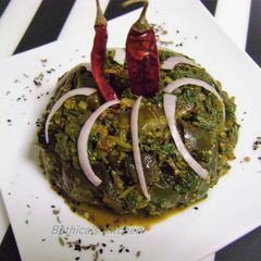 A picture of Palong Shaag Begun Torkari (Spinach Eggplant Curry).