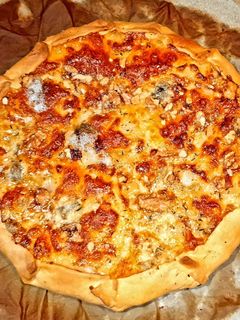 Una foto de Galette de peras y gorgonzola