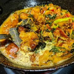 A picture of Macha besara (fish cooked in mustard paste).