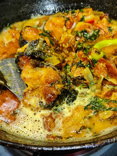 A picture of Macha besara (fish cooked in mustard paste).