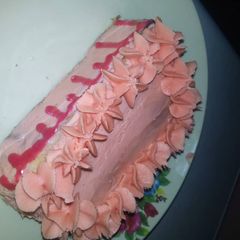 A picture of Bread with butter icing frosting.