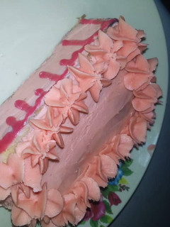 A picture of Bread with butter icing frosting.