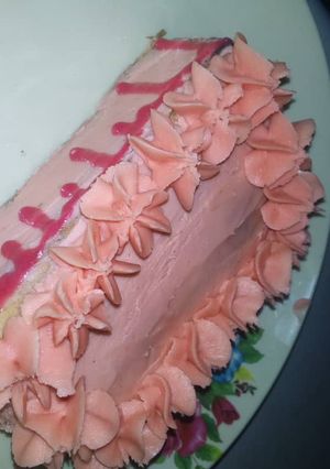 A picture of Bread with butter icing frosting.