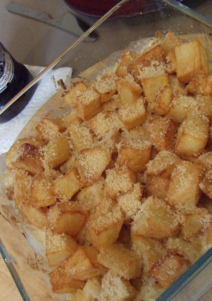 Una foto de Bacalao con nata y patatas fritas al horno