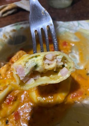 Una foto de Sorrentinos de jamón y queso