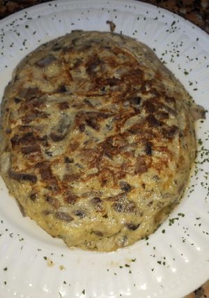 Una foto de Tortilla de champiñones