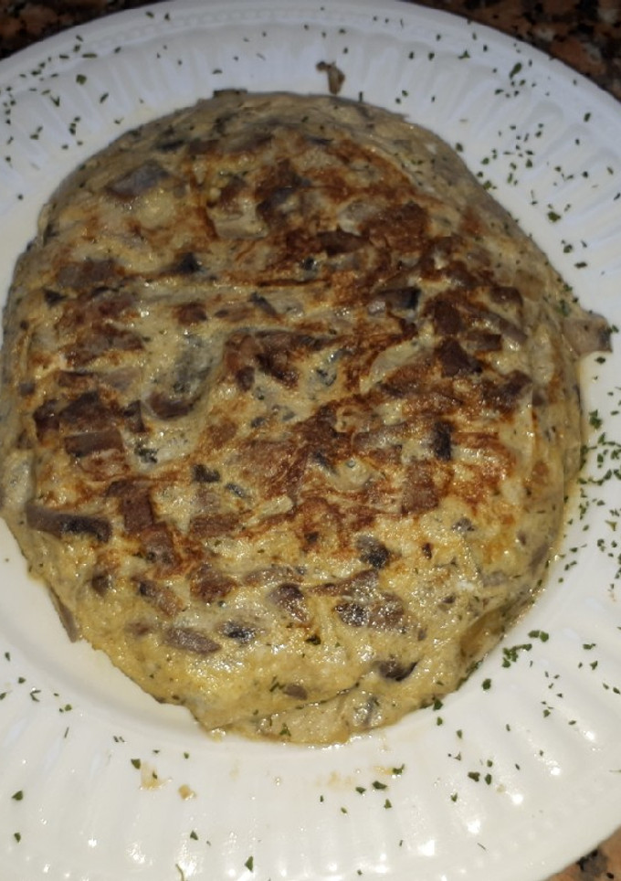 Una foto de Tortilla de champiñones