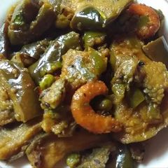 A picture of Baigun chigri(dry brinjal and prawn sabji).