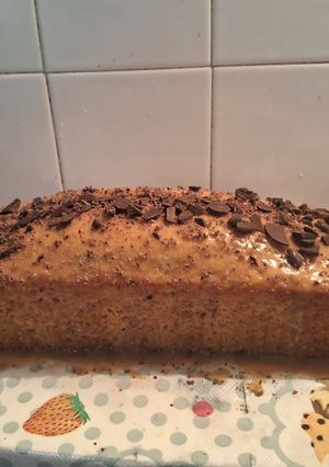 Una foto de Budín marmolado de tangerina y jengibre con glaseado de dulce de leche