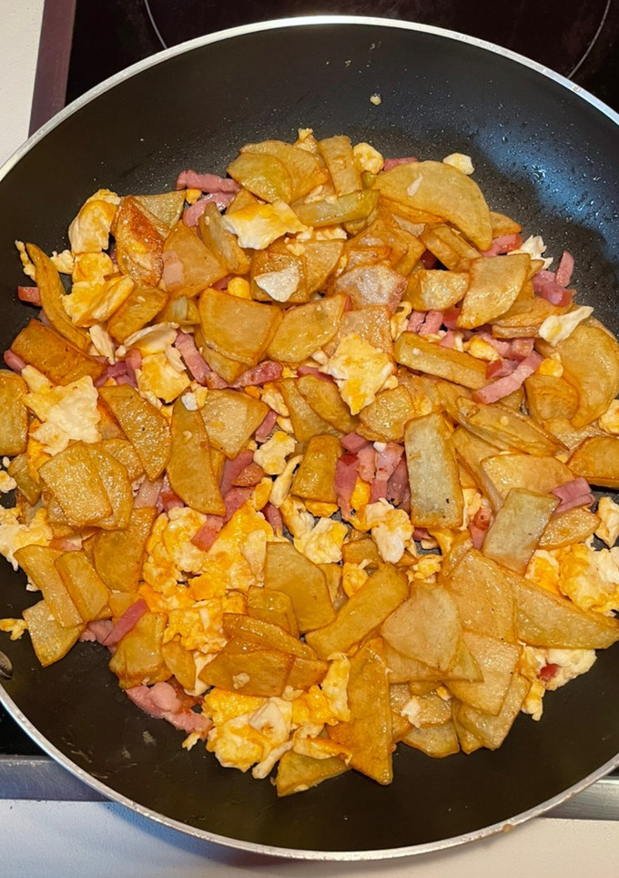 Una foto de Patatas con huevos y bacon