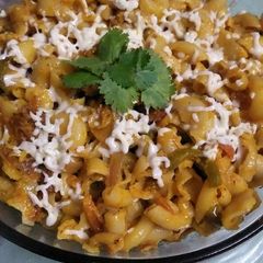 A picture of Cheesy and creamy macaroni.