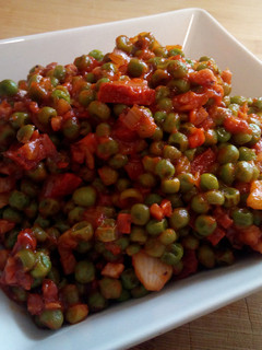 Una foto de Guisantes con tomate