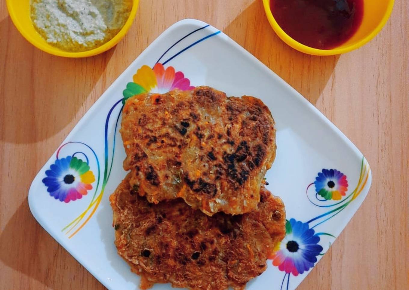 Potato pancakes with coconut sauce and tomato sauce