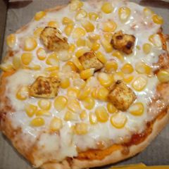 A picture of Cheese and corn pizza.