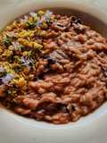 Risotto al radicchio mantecato alla ricotta con noci e rosmarino
