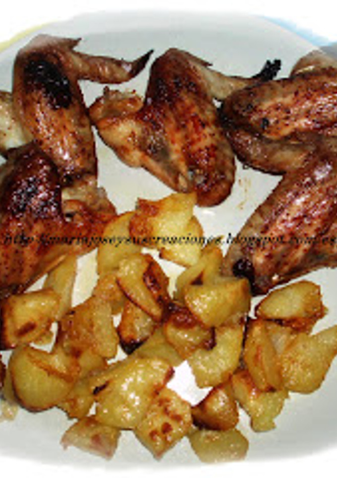 Una foto de Alitas de pollo a la naranja