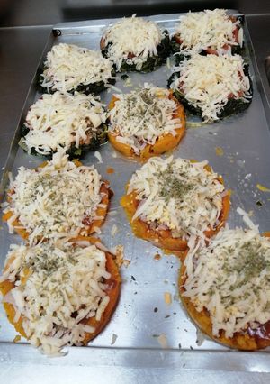 Una foto de Pizzetas de calabaza y espinacas