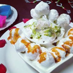 A picture of Moong daal spicy dahi vada.
