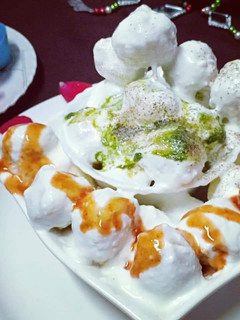 A picture of Moong daal spicy dahi vada.