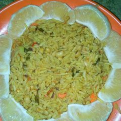 A picture of Coconut jollof rice With lemon.